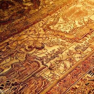 A luxurious tapestry of golden saffron threads interwoven with ancient trade routes and Persian scrolls.